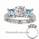 Two aquamarine side stones engagement ring
