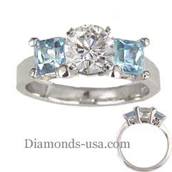 Two aquamarine side stones engagement ring