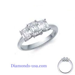 Emerald cut three diamond ring