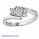Embracing emerald cut three stone engagement ring