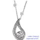 Drop pendant with surrounding diamonds