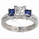 Hand engraved engagement ring with Sapphires