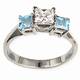Engagement ring with Princess side Aquamarines