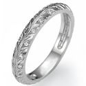 Hand engraved leaf motif matching wedding band