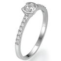 Petit half bezel engagement ring