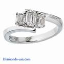 Embracing emerald cut three stone engagement ring
