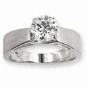 Wide band solitaire diamond engagement ring