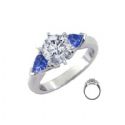 Engagement ring with side Sapphires Pear Shapes