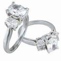Oval cut three stone engagement ring