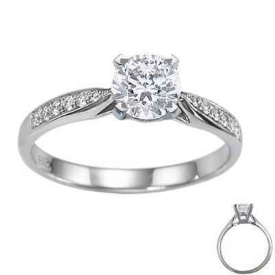 Cathedral engagement ring with side diamonds