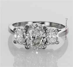 Three stone engagement ring with Oval diamonds