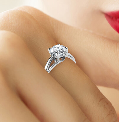 Solitaire engagement ring with a twist, Margaret