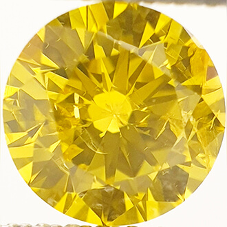 0.90 carat, Round diamond, Fancy vivid yellow , color enhanced, SI1 clarity