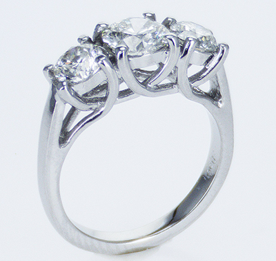 Three stones diamond CrissCross ring