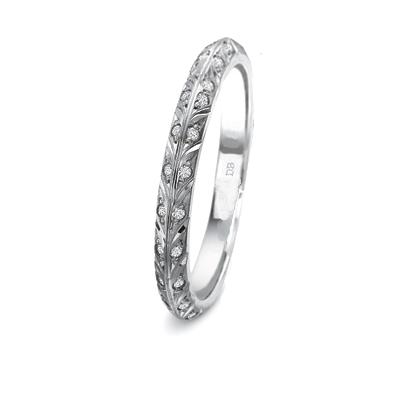 Hand engraved leaf motif matching wedding band, set with 24 diamonds