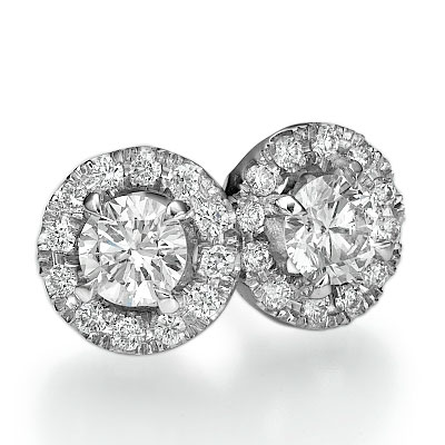 Halo earring studs with 0.31 carats surrounding round diamonds