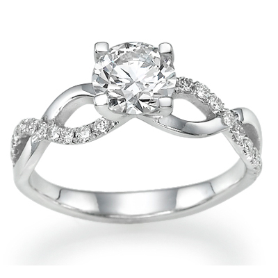 0.65 Carats, Pear, Engagement ring with side stones settings