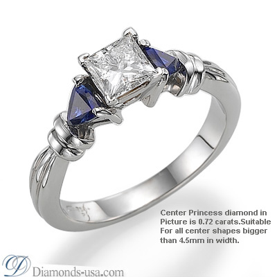 Two blue Sapphires side triangles engagement ring