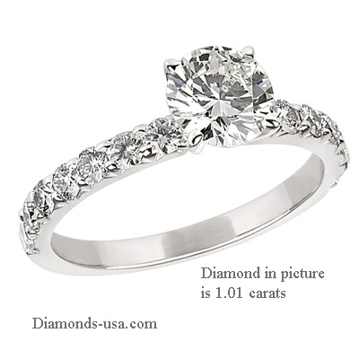 Engagement ring side set with round diamonds