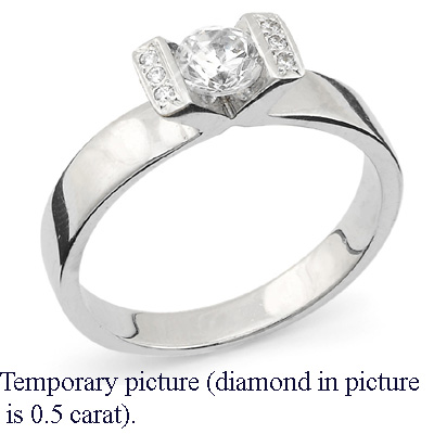 0.67 Carats, Round, Engagement ring with side stones settings