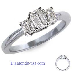 Emerald cut three diamond ring