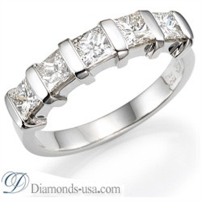 Anniversary ring, 1.25 carats Princess diamonds.