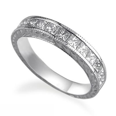 Hand engraved Princess diamonds wedding band.