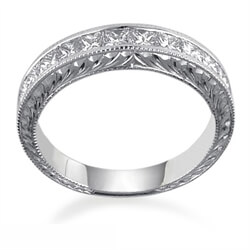 Picture of Hand engraved Princess diamonds wedding band.