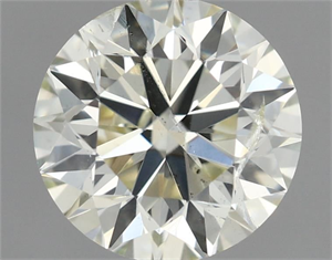 Picture of Natural Diamond 0.90 Carats, Round with Very Good Cut, M Color, SI2 Clarity and Certified by IGI