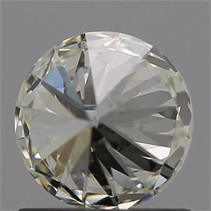 Picture of Natural Diamond 0.75 Carats, Round with Excellent Cut, K Color, VS2 Clarity and Certified by GIA