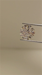 Picture of Natural Diamond 2.12 Carats, Round with Excellent Cut, K Color, VVS2 Clarity and Certified by GIA