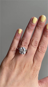 Picture of Natural Diamond 5.70 Carats, Round with Excellent Cut, K Color, SI2 Clarity and Certified by GIA