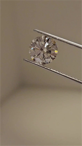Picture of Natural Diamond 1.74 Carats, Round with Excellent Cut, J Color, VS1 Clarity and Certified by GIA