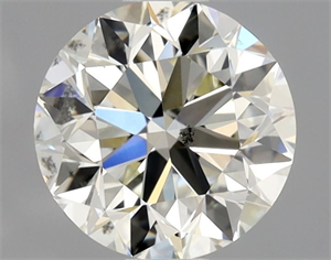Picture of Natural Diamond 0.90 Carats, Round with Very Good Cut, M Color, SI1 Clarity and Certified by GIA