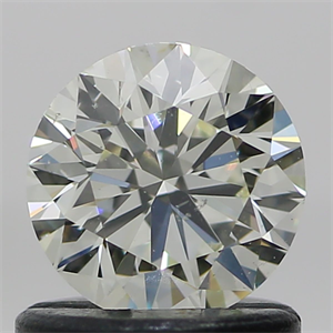 Picture of Natural Diamond 0.76 Carats, Round with Excellent Cut, N Color, VS2 Clarity and Certified by GIA