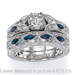 Picture of Hand engraved, vintage designers Engagement ring with blue Sapphires