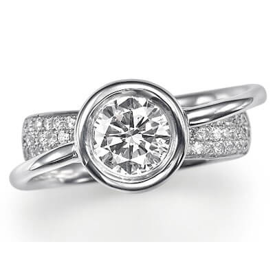 Anniversary or Engagement ring, low profile bezel set. 0.45Cts side diamonds