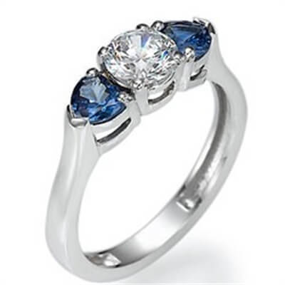 Engagement ring with two Heart Blue Sapphires