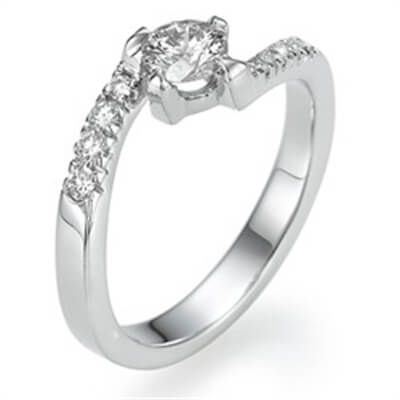 Engagement ring with side diamonds