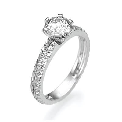Leaf motif with diamonds engagement ring
