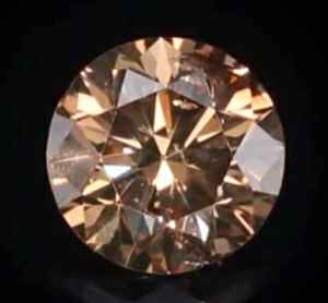 Picture of 0.77 Carats, Round Diamond with Ideal Cut, Fancy Golden-Chocolate color , SI1 Clarity and Certified By EGL