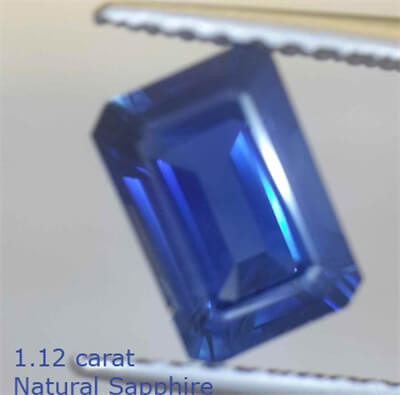 Zafiro azul Esmeralda de 1.12 quilate con diamantes de 1/3 Ct.