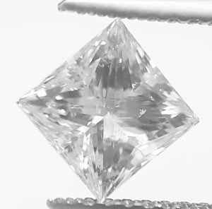 Foto 1.20 quilates, princesa Diamond con corte ideal, color G, pureza SI1 y certificado por IGL de