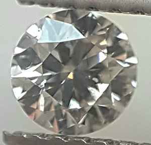 Picture of 0.34 Carats, Round Diamond with Very Good Cut, G SI1, Certified by EGL.