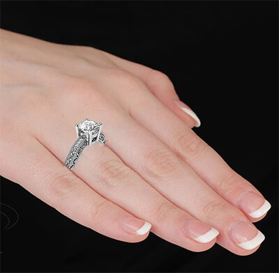 Engagement ring with side diamonds, filigree designs model, basket head