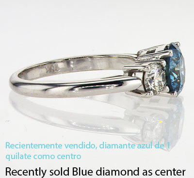 Anillo de tres diamantes, lados fijos 0.46 Cts TW