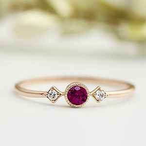 Ruby stone in a dainty engagement ring