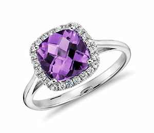 Cushion cut Amethyst in a diamonds halo ring