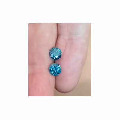 Foto 1.13 Diamante natural azul vivo elegante, mejorado en color de