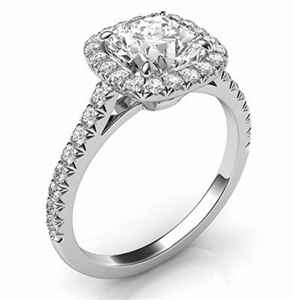 Cushion cut diamond set in halo engagement ring